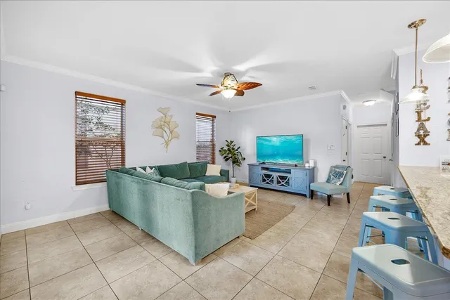 a kitchen with a sink cabinets and window