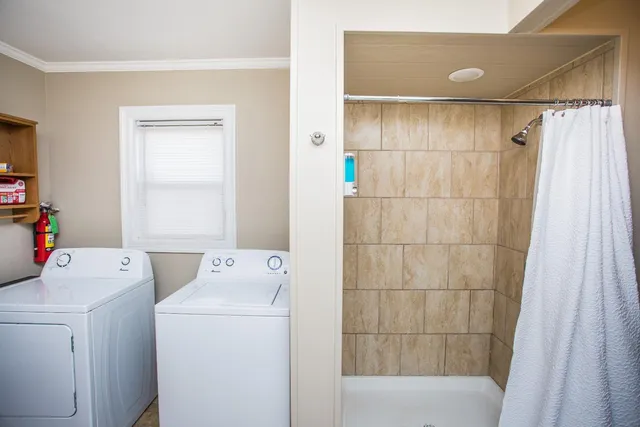 a utility room with dryer and washer
