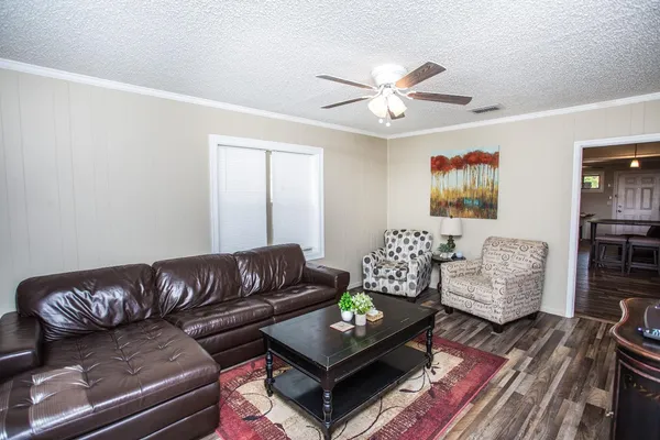 a living room with furniture and a couch