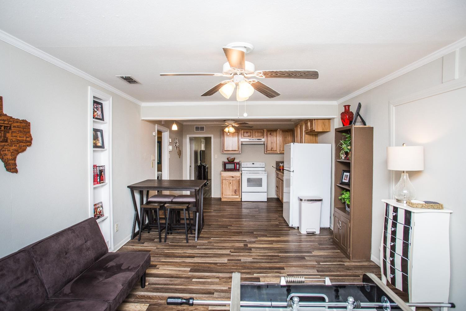 2418 23rd Street Lubbock, TX 79411 - Photo 6 of 17 a view of a dining room with furniture