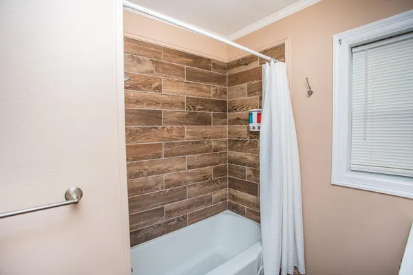 a bathroom with a bathtub