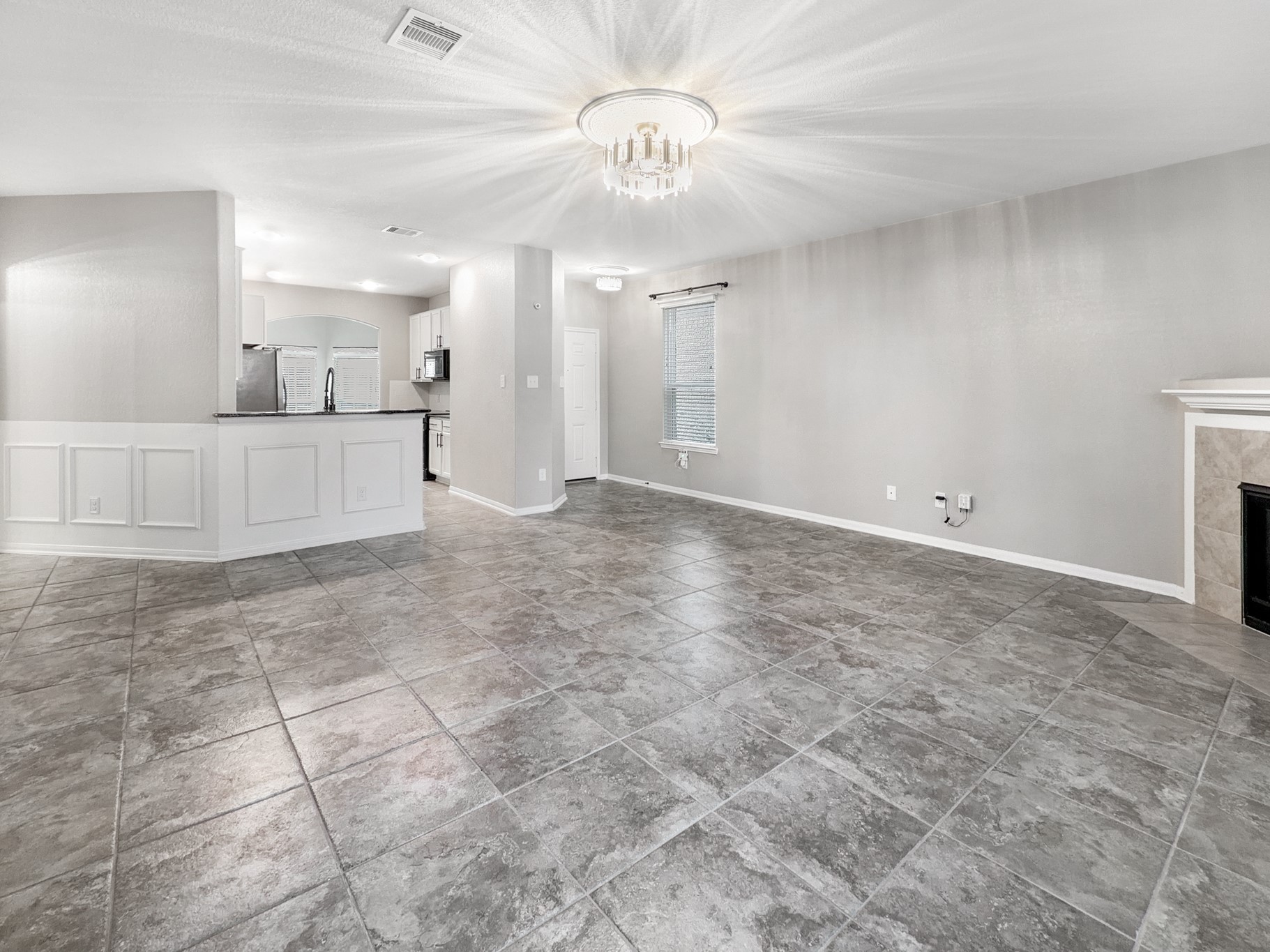 2269 Garden Square Path Spring, TX 77386 - Photo 7 of 18 a view of an empty room and kitchen view