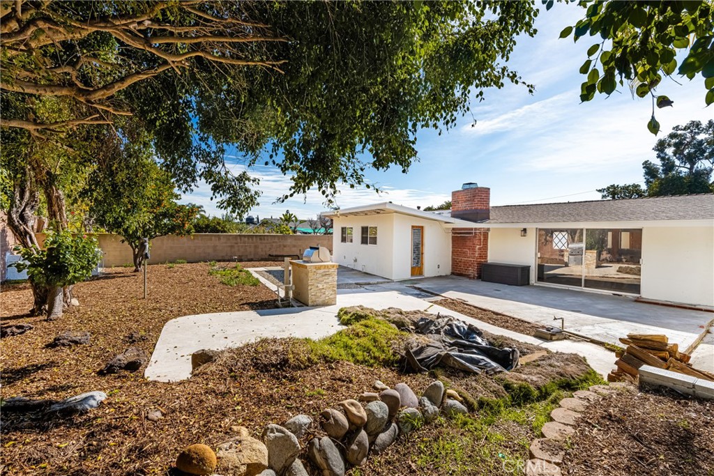 448 Princeton Drive Costa Mesa, CA 92626 - Photo 18 of 33 a view of a house with backyard