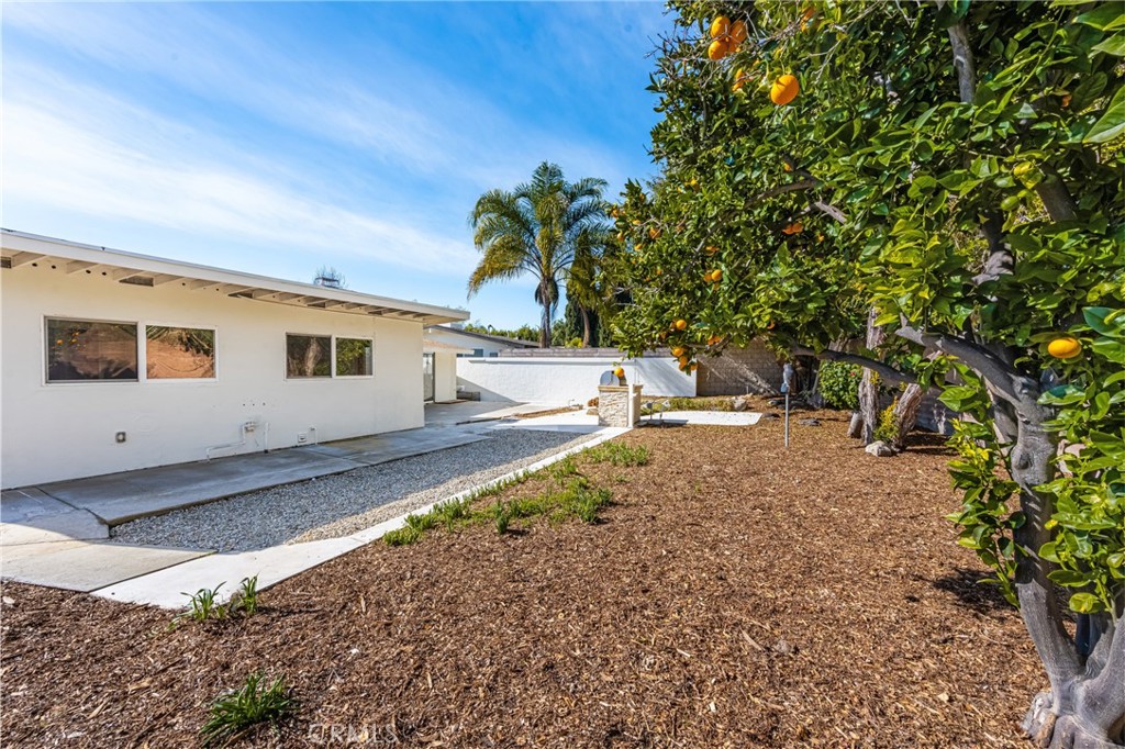 448 Princeton Drive Costa Mesa, CA 92626 - Photo 22 of 33 a house view with a backyard space