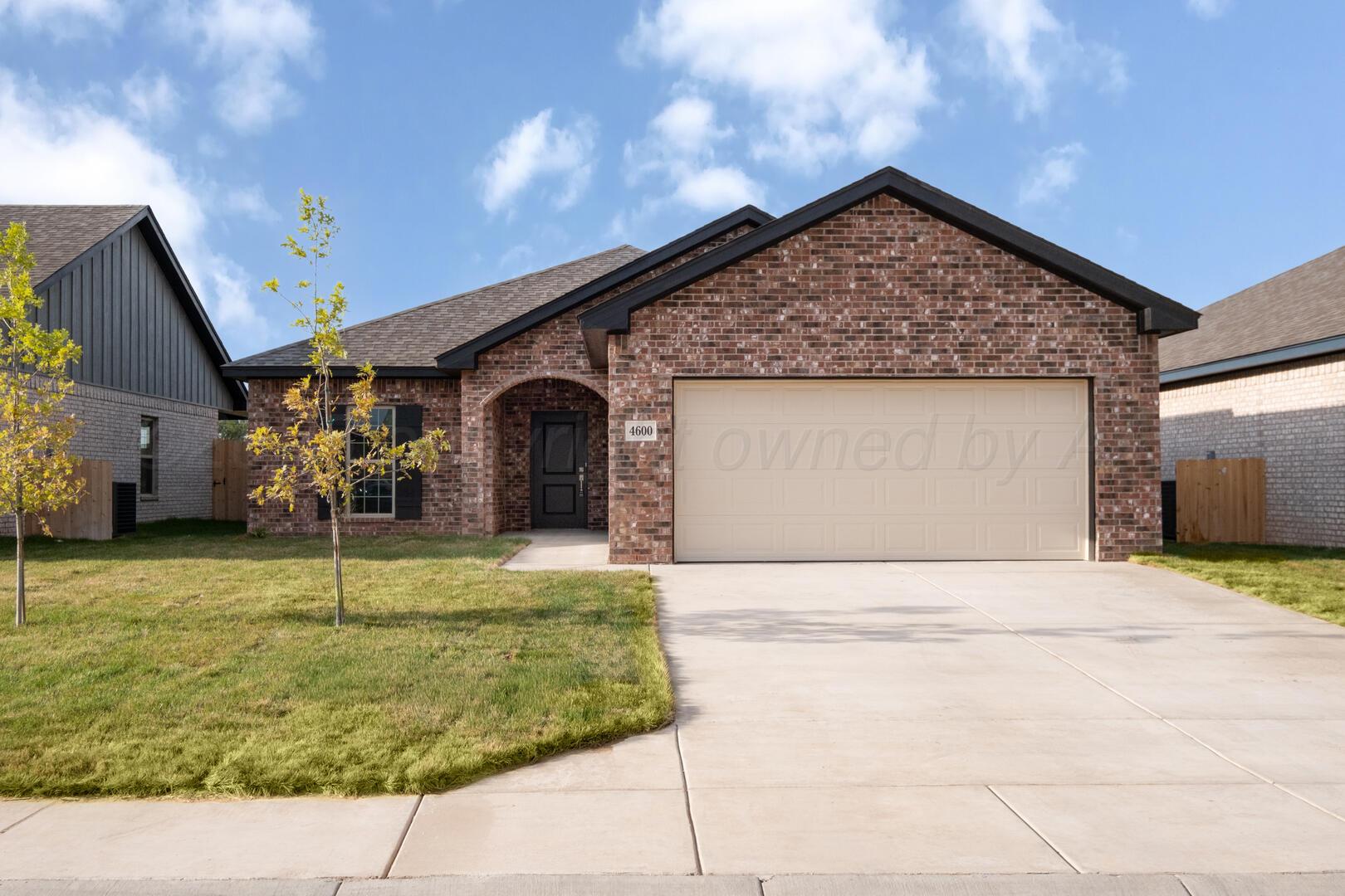 a view of a backyard of the house