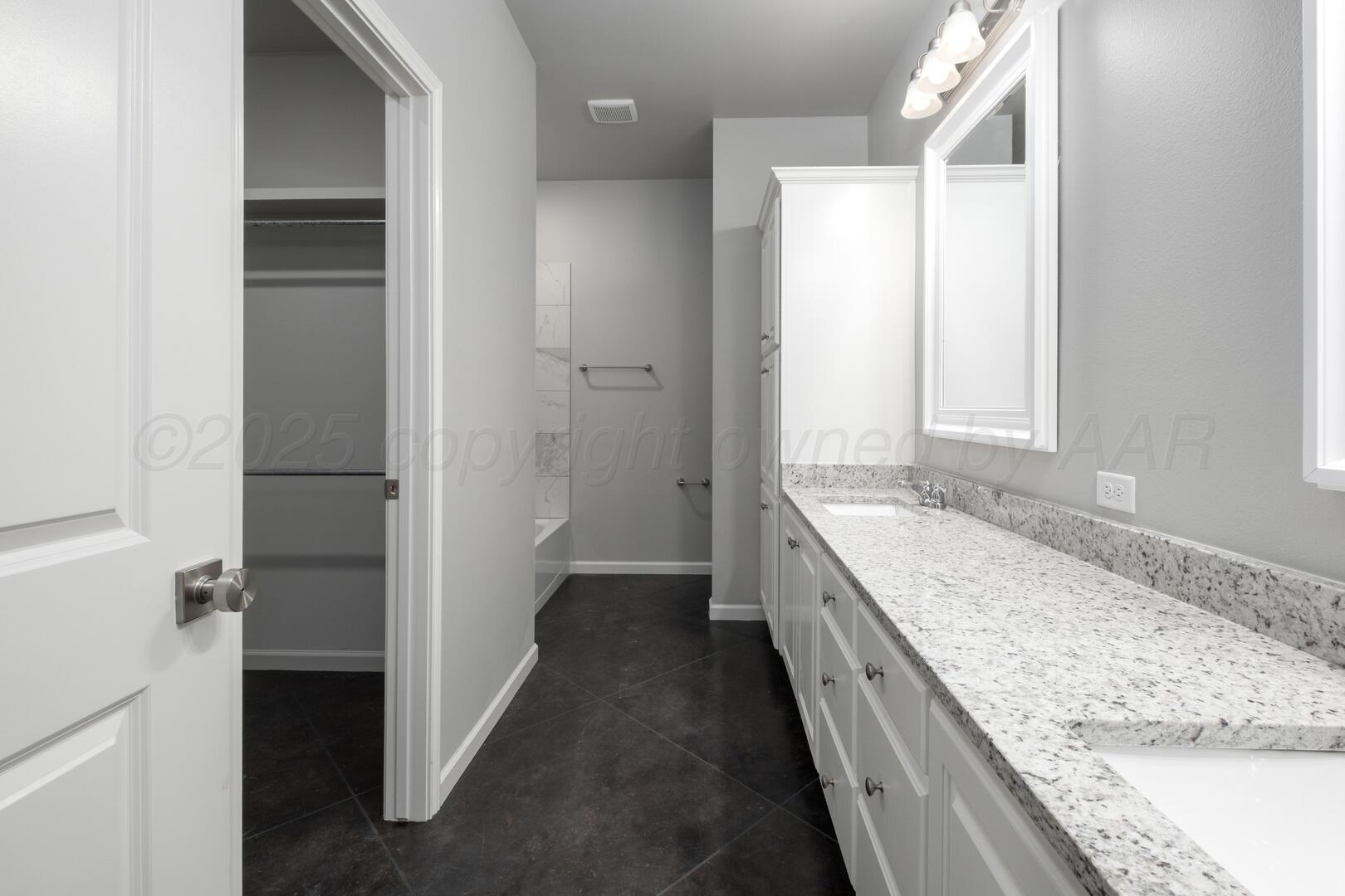 4600 Richardson Road Amarillo, TX 79118 - Photo 18 of 29 a bathroom with a granite countertop double vanity and a granite counter tops