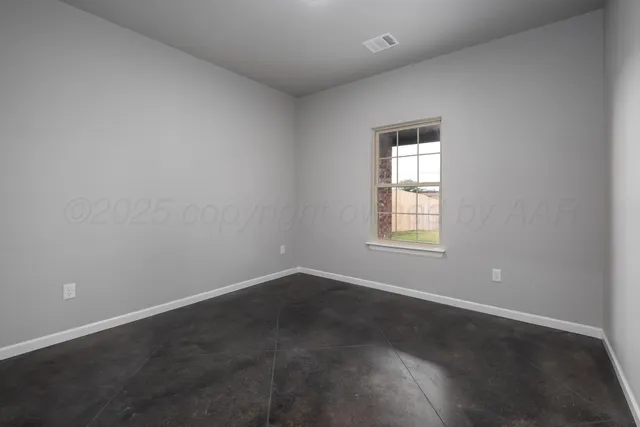 an empty room with a window