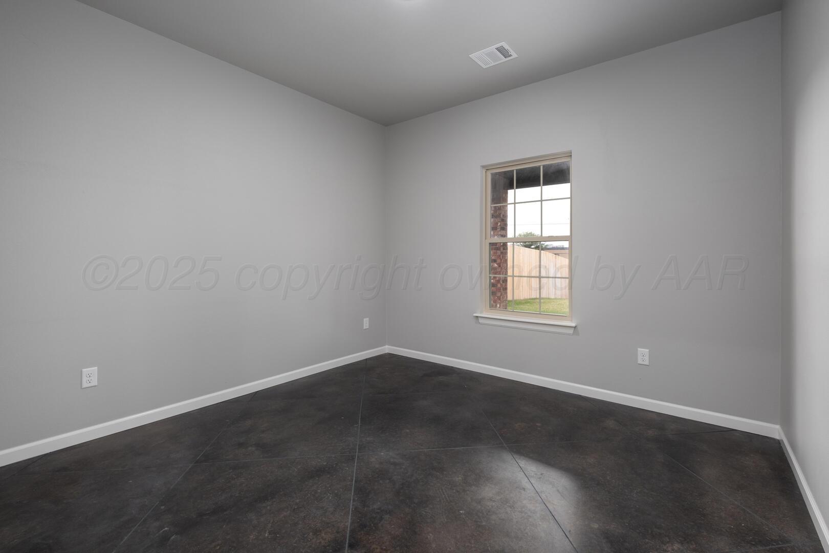 4600 Richardson Road Amarillo, TX 79118 - Photo 20 of 29 an empty room with a window