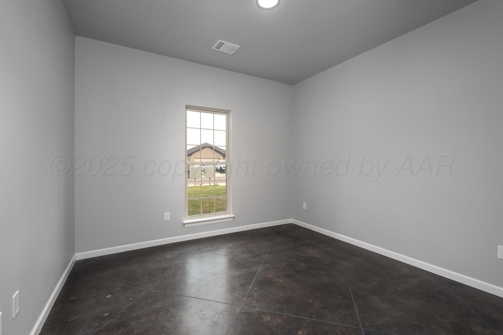 4600 Richardson Road Amarillo, TX 79118 - Photo 24 of 29 an empty room with a window