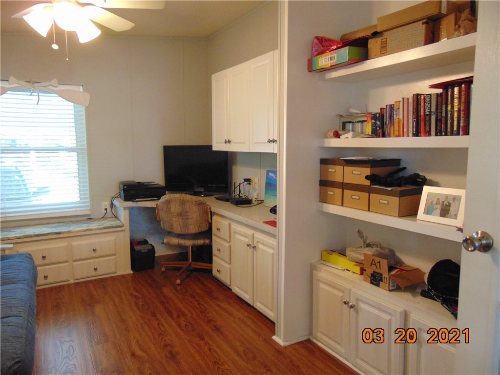 7615 Montauk Avenue, Unit R9 Micco, FL 32976 - Photo 19 of 36 a bedroom with a workspace