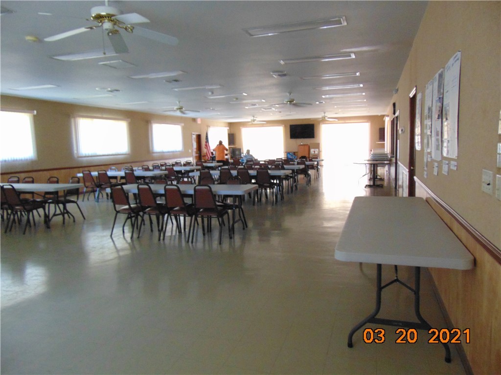 7615 Montauk Avenue, Unit R9 Micco, FL 32976 - Photo 30 of 36 a view of a dining room with furniture window and outside view
