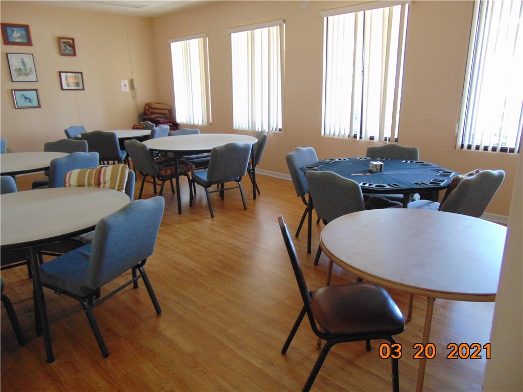 7615 Montauk Avenue, Unit R9 Micco, FL 32976 - Photo 33 of 36 a view of a dining room with furniture and window