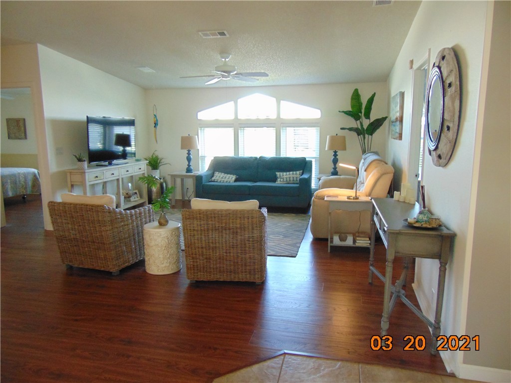 7615 Montauk Avenue, Unit R9 Micco, FL 32976 - Photo 9 of 36 a living room with furniture and a large window