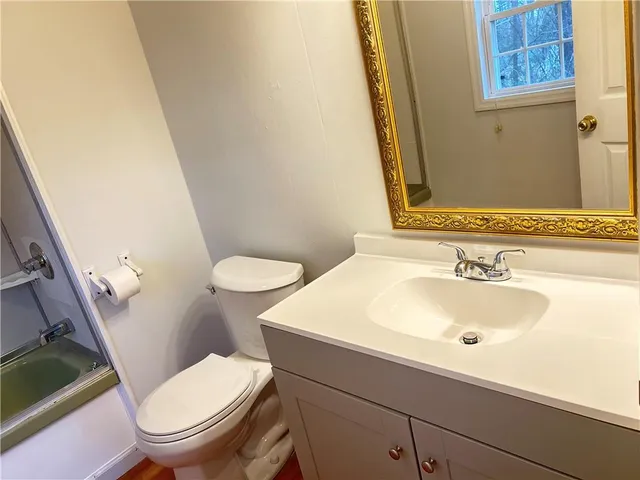 a bathroom with a sink and a toilet