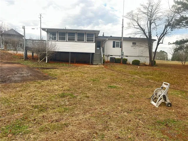 a house view with a outdoor space