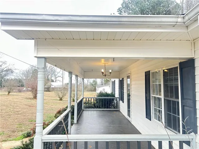 a view of a living room and entry way