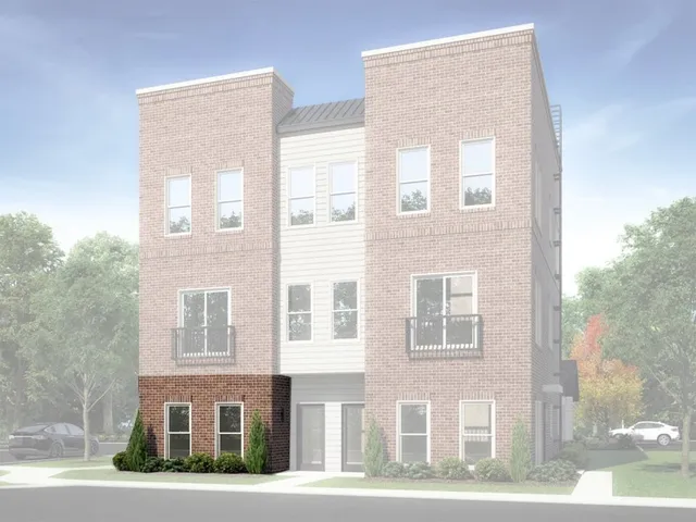 a front view of a building with brick walls