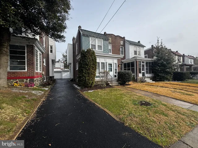 a front view of house with yard