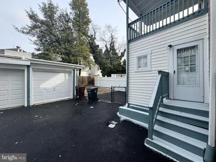 a view of a back yard of the house