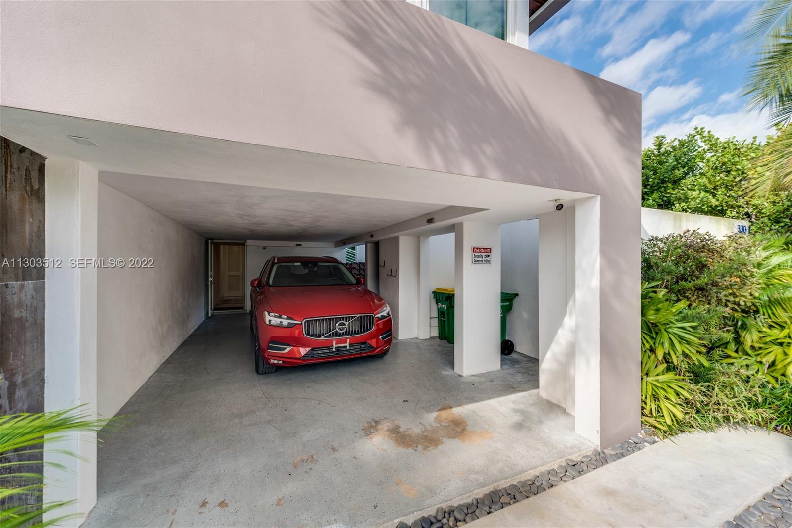 330 Fernwood Road, Unit 1 Key Biscayne, FL 33149 - Photo 28 of 29 a car parked in garage