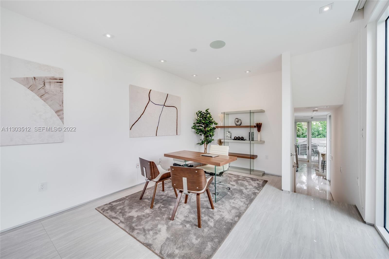 330 Fernwood Road, Unit 1 Key Biscayne, FL 33149 - Photo 5 of 29 a view of a dining room with furniture