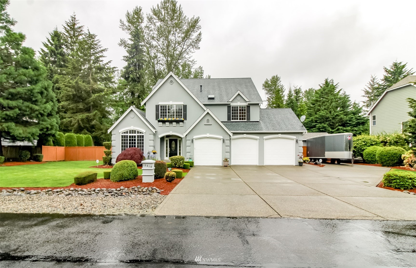 front view of a house with a yard