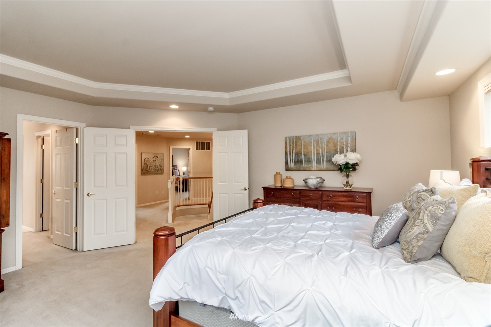18910 3rd Street East Lake Tapps, WA 98391 - Photo 11 of 18 a bedroom with a large bed and a view of bedroom