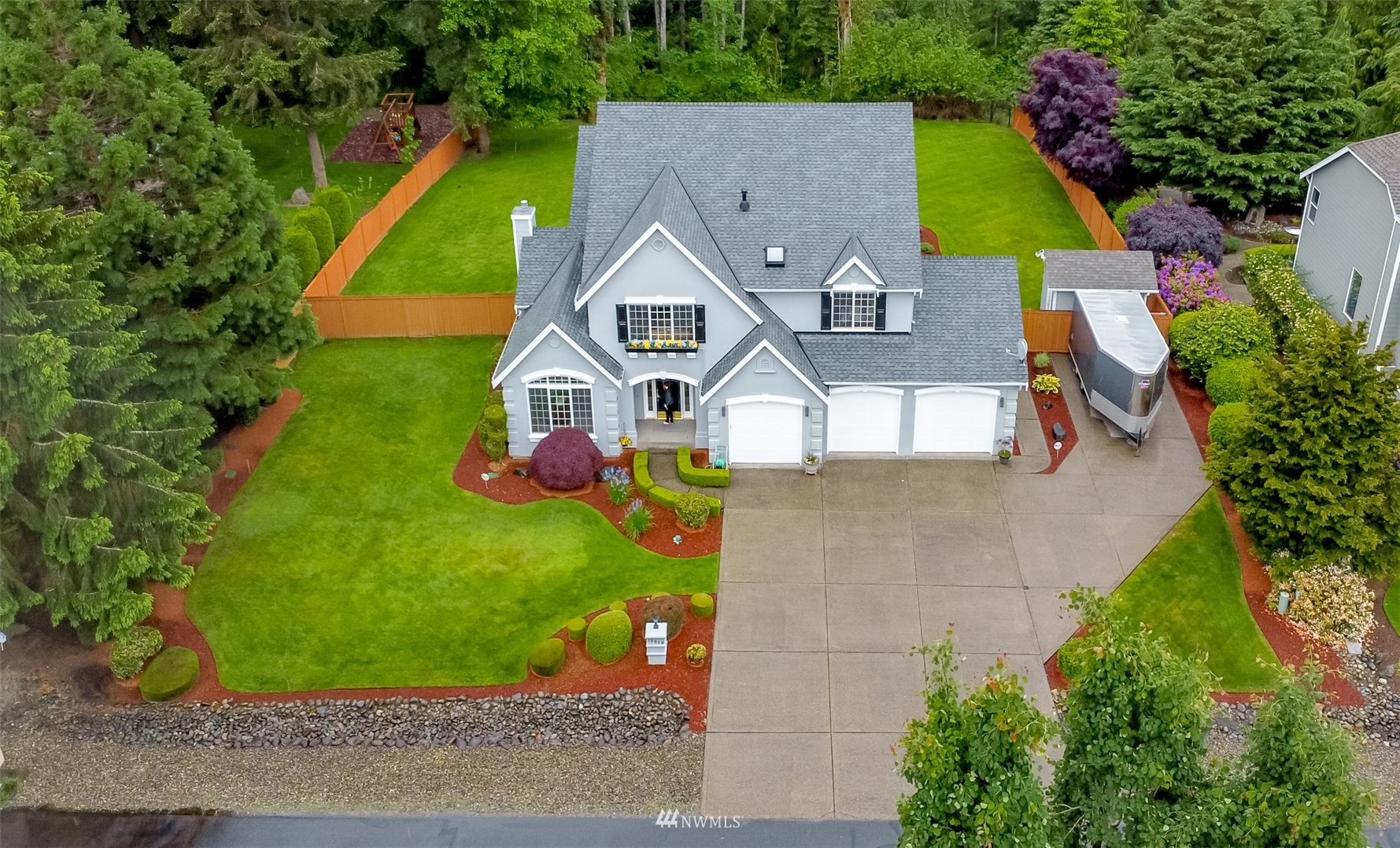 18910 3rd Street East Lake Tapps, WA 98391 - Photo 2 of 18 an aerial view of residential houses with yard and swimming pool