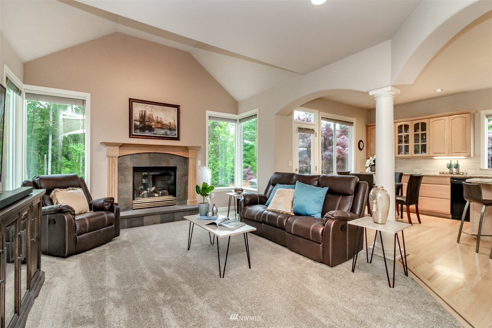 18910 3rd Street East Lake Tapps, WA 98391 - Photo 6 of 18 a living room with furniture and a fireplace