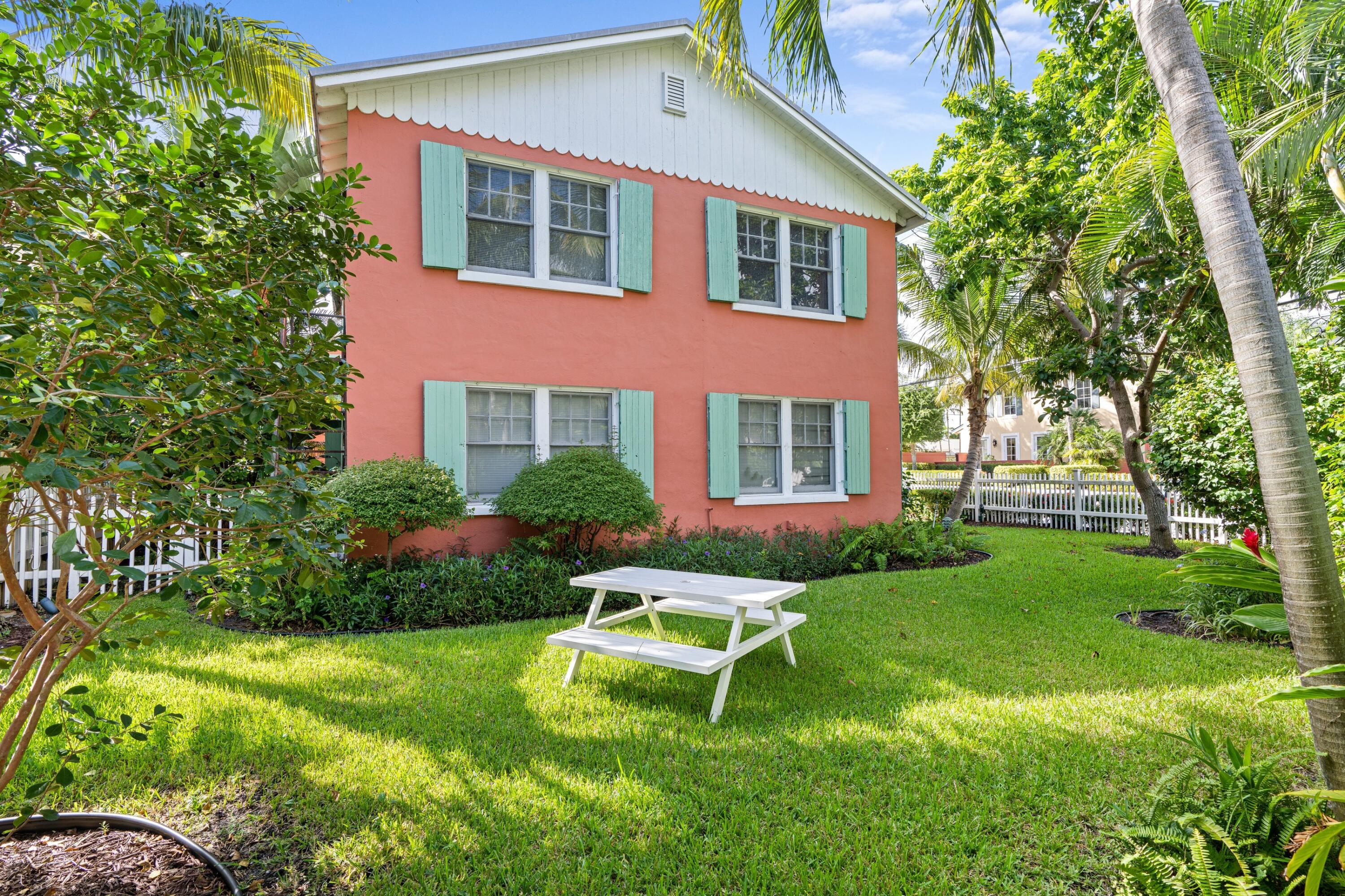 102 Southeast 7th Avenue, Unit VILLA 2 Delray Beach, FL 33483 - Photo 26 of 28 a house view with a sitting space and garden