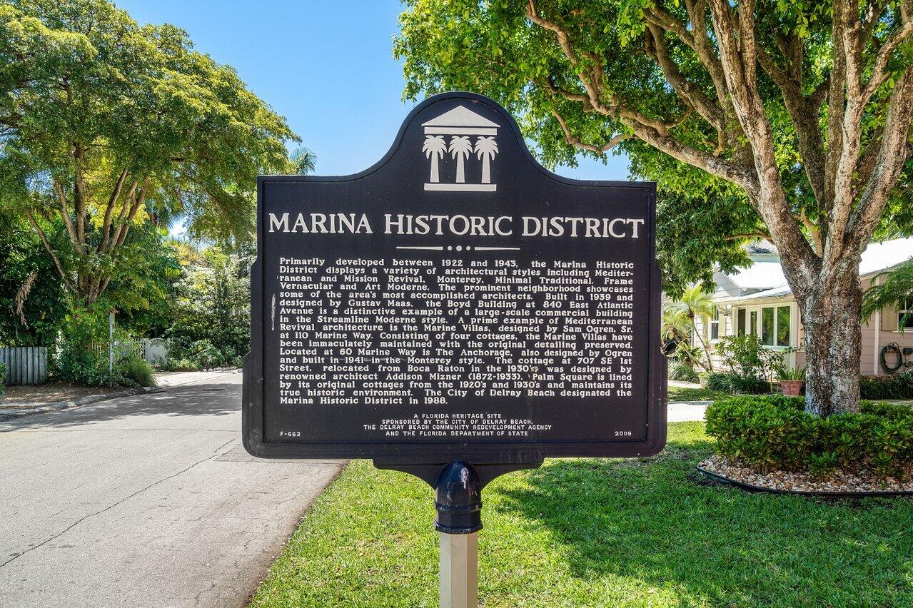 102 Southeast 7th Avenue, Unit VILLA 2 Delray Beach, FL 33483 - Photo 4 of 28 a front view of a house with garden