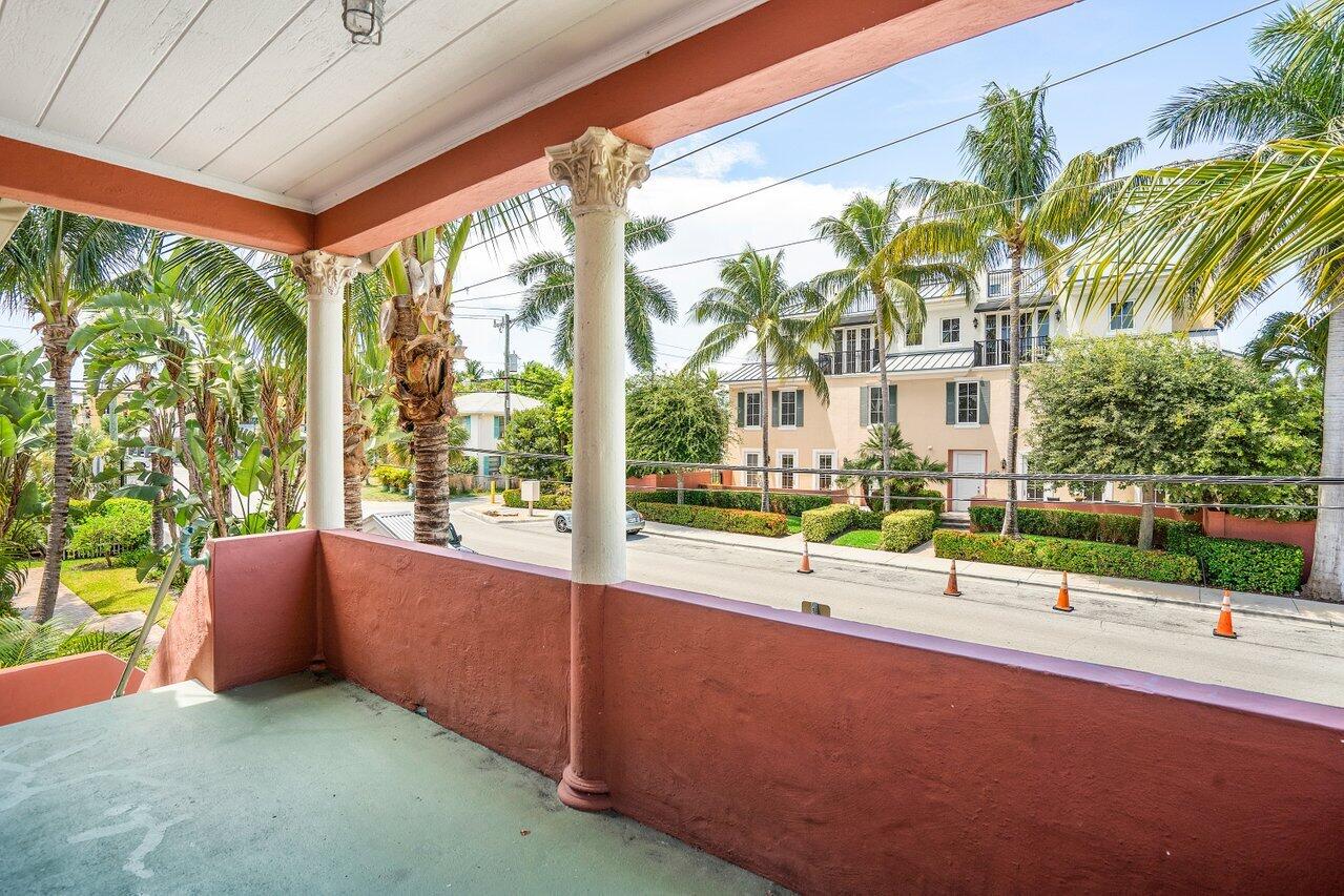 102 Southeast 7th Avenue, Unit VILLA 2 Delray Beach, FL 33483 - Photo 6 of 28 a view of swimming pool with outdoor seating