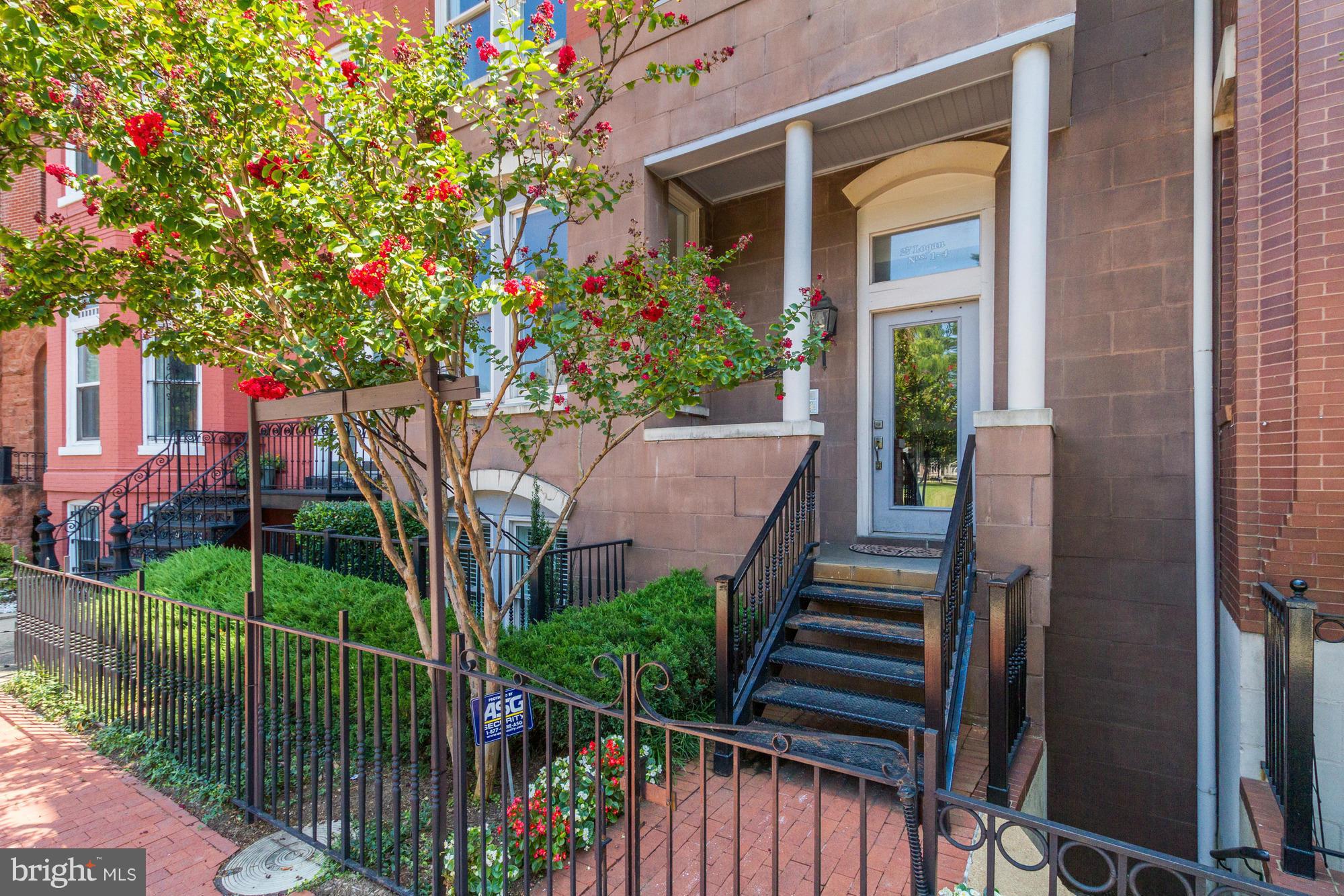 27 Logan Circle Northwest, Unit 1 Washington, DC 20005 - Photo 2 of 30 a view of a house with backyard and plants