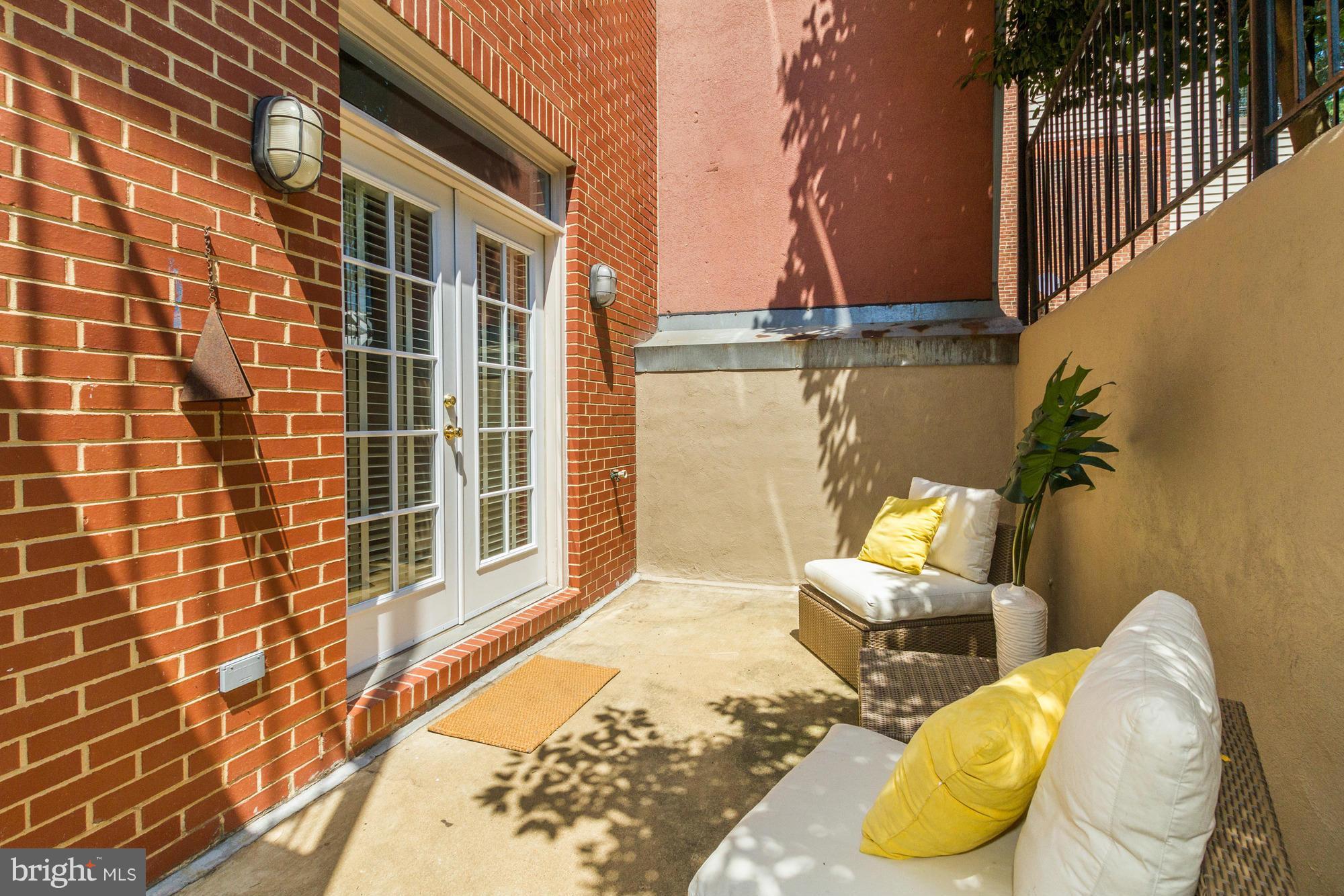 27 Logan Circle Northwest, Unit 1 Washington, DC 20005 - Photo 29 of 30 a view of a lounge chairs in the balcony