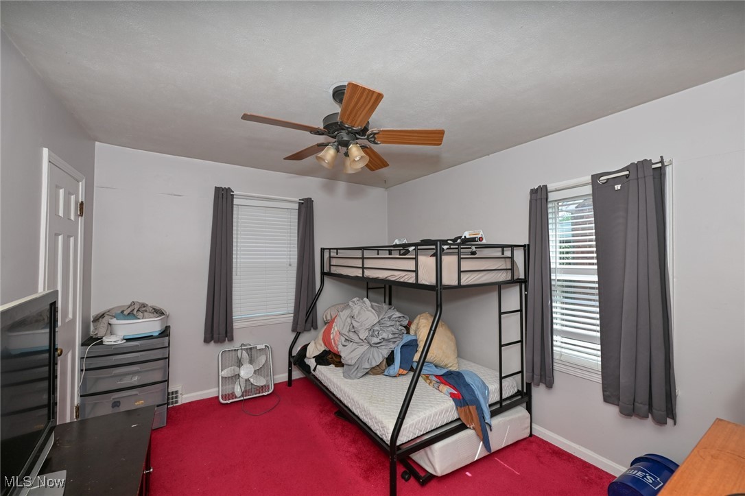 4166 Verona Road Cleveland, OH 44121 - Photo 32 of 43 Carpeted bedroom with ceiling fan