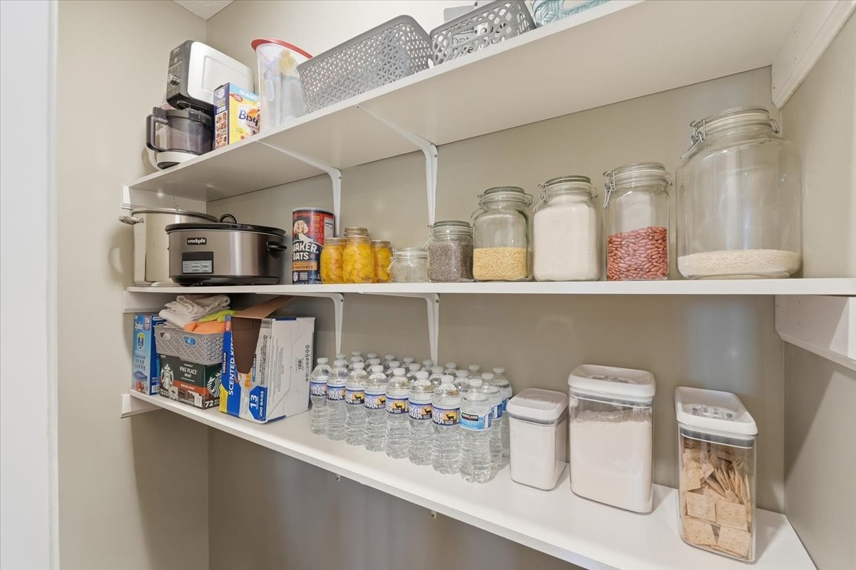 186 L Mitchell Road Flintville, TN 37335 - Photo 15 of 40 a shelf with books and knick knacks on it