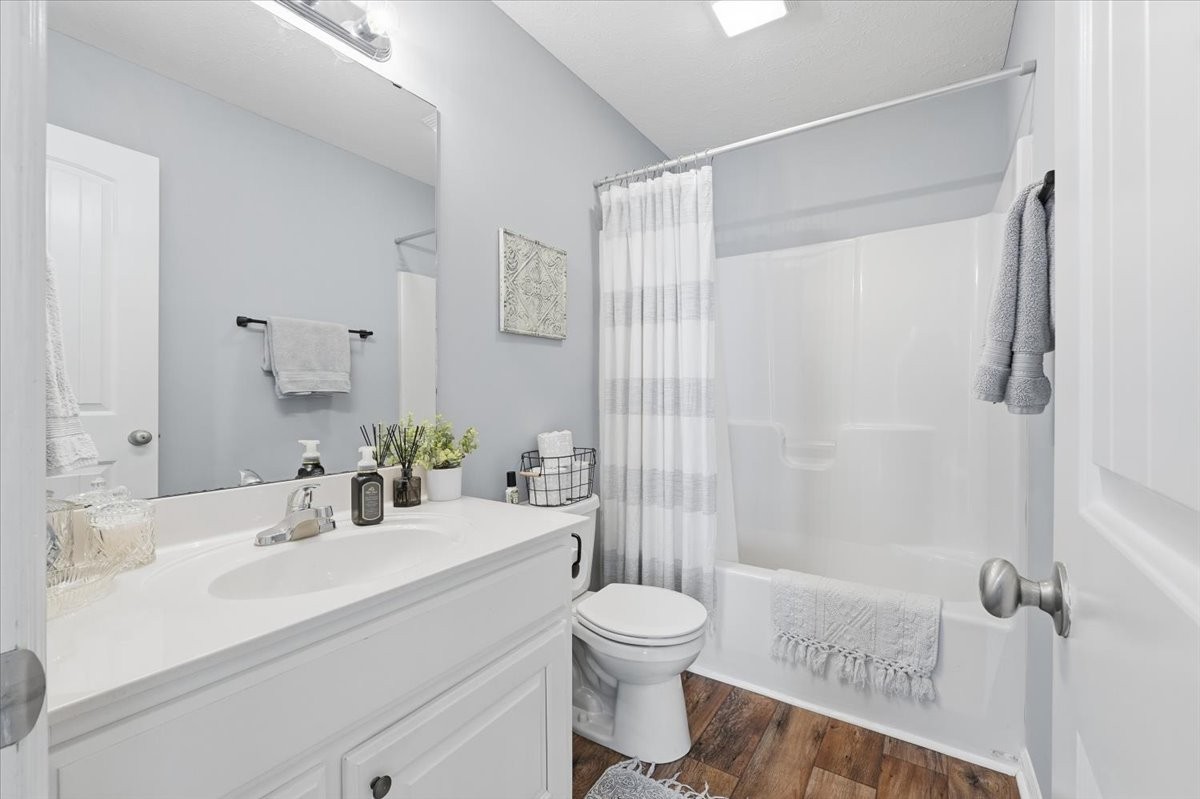 186 L Mitchell Road Flintville, TN 37335 - Photo 21 of 40 a bathroom with a sink toilet and shower