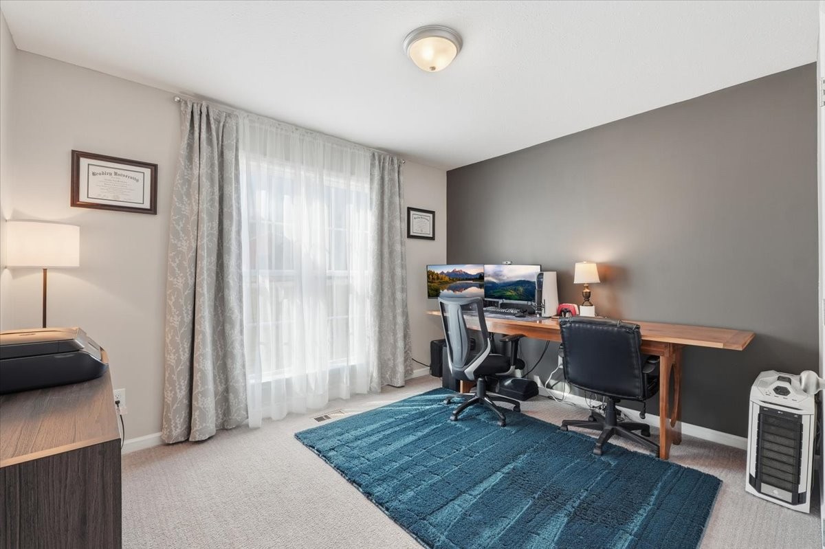 186 L Mitchell Road Flintville, TN 37335 - Photo 22 of 40 a view of a workspace with furniture and a window