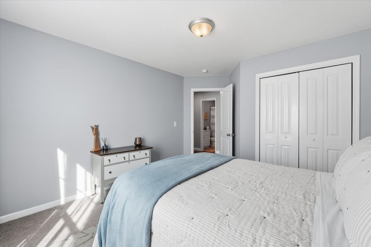 186 L Mitchell Road Flintville, TN 37335 - Photo 24 of 40 a bedroom with a bed and a window