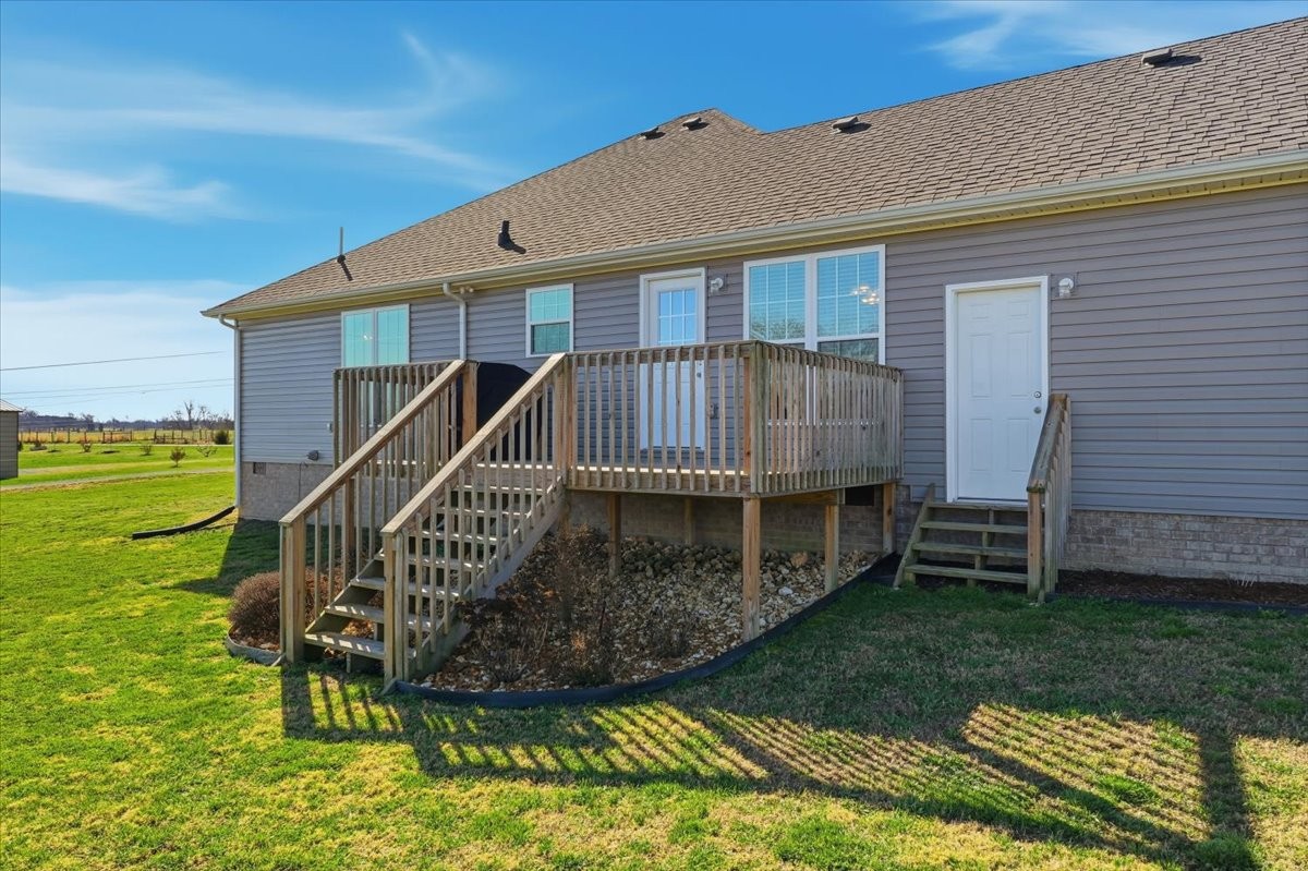186 L Mitchell Road Flintville, TN 37335 - Photo 30 of 40 a view of a house with a wooden deck