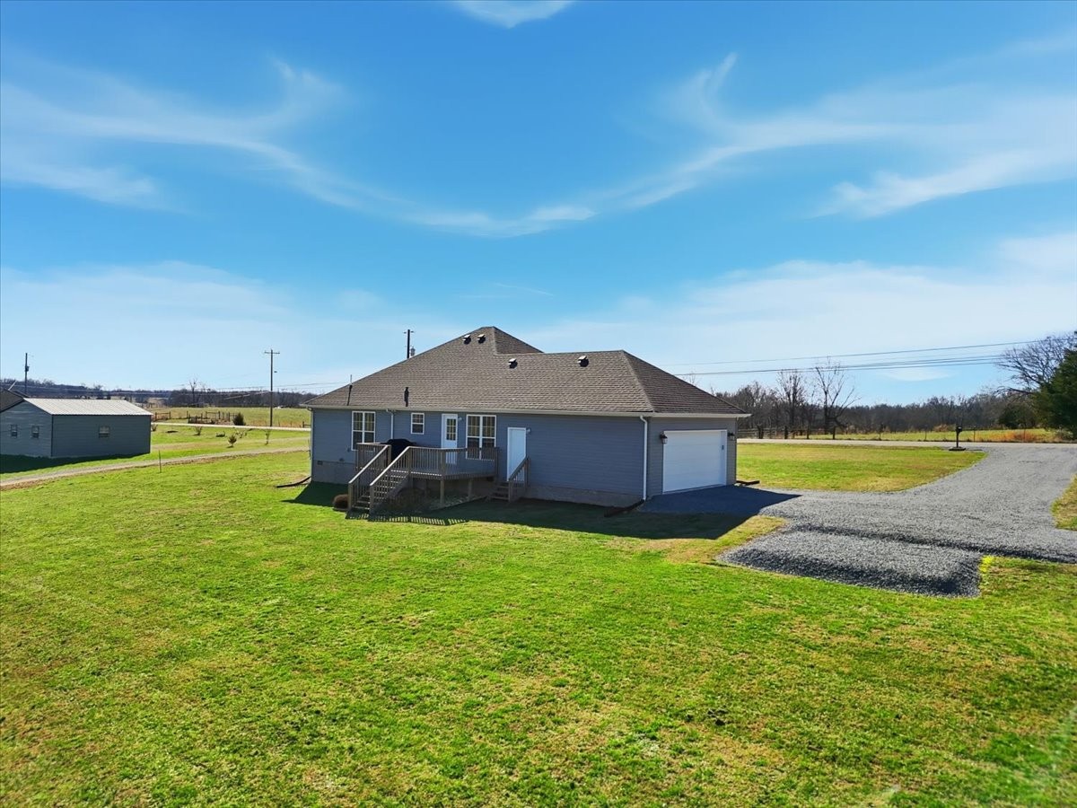 186 L Mitchell Road Flintville, TN 37335 - Photo 34 of 40 a view of a house with a yard