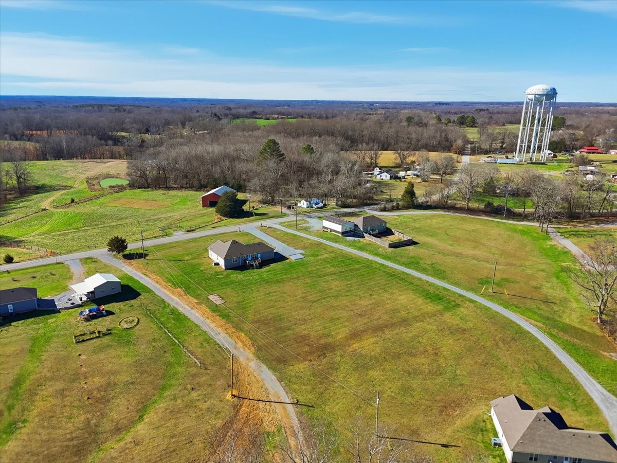 186 L Mitchell Road Flintville, TN 37335 - Photo 36 of 40 a view of a swimming pool with a table and chairs