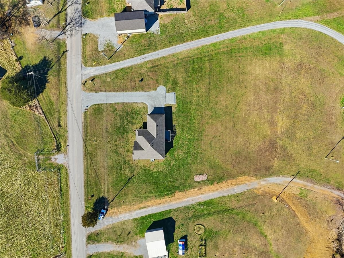 186 L Mitchell Road Flintville, TN 37335 - Photo 40 of 40 a bathroom with a bathtub and shower