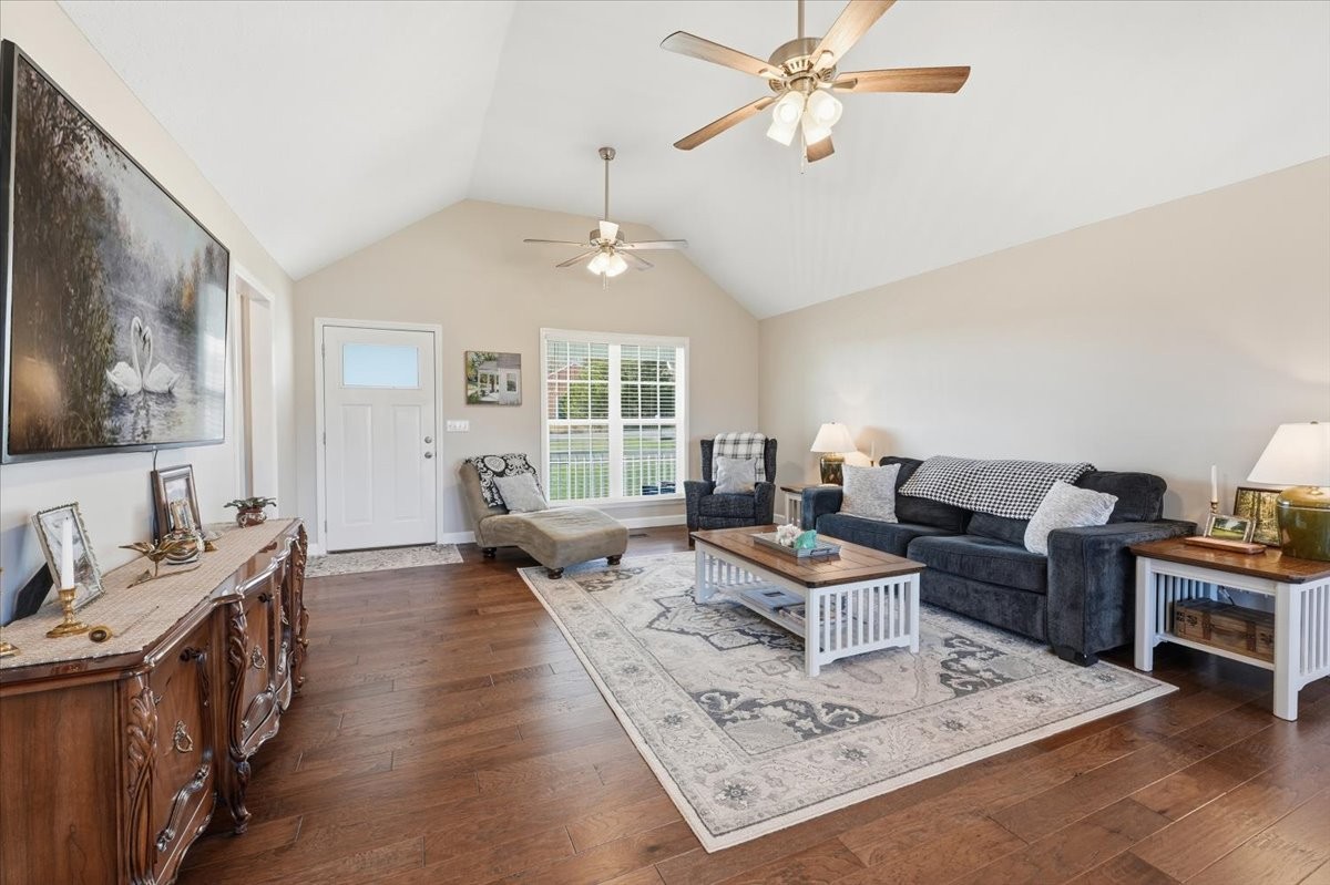 186 L Mitchell Road Flintville, TN 37335 - Photo 7 of 40 a living room with furniture a chandelier and a window