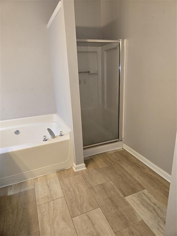 1558 Silver Ridge Drive Southwest Austell, GA 30106 - Photo 16 of 24 a bathroom with a bathtub