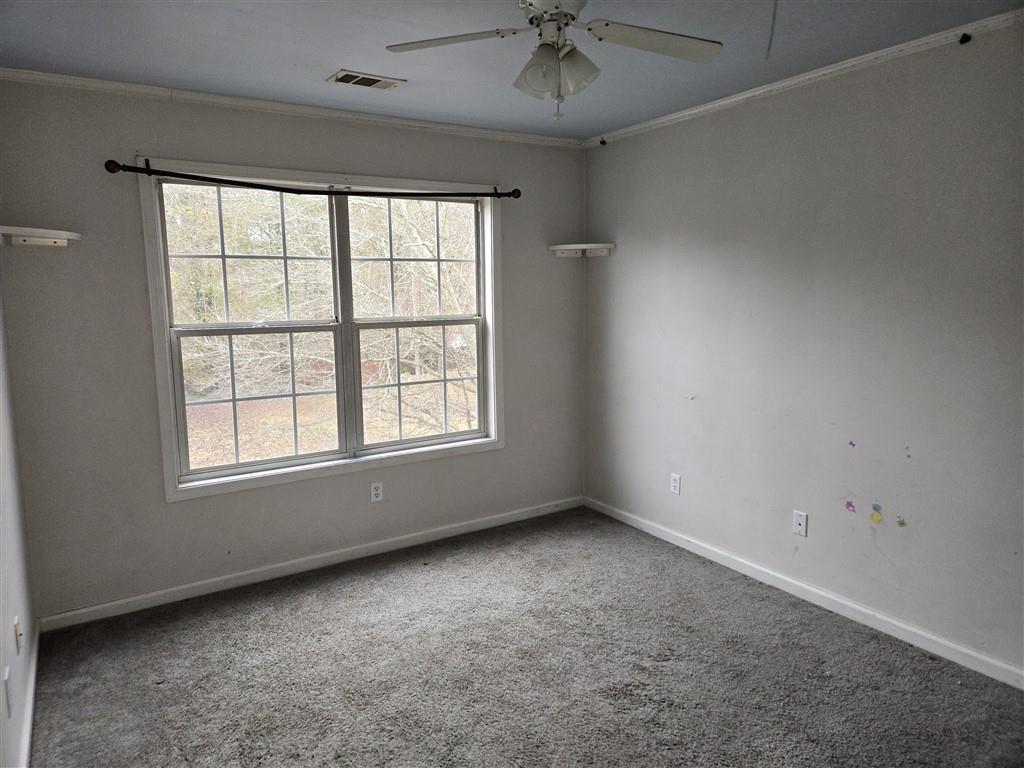 1558 Silver Ridge Drive Southwest Austell, GA 30106 - Photo 18 of 24 an empty room with a window