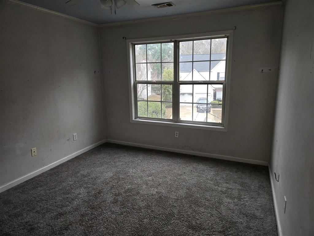 1558 Silver Ridge Drive Southwest Austell, GA 30106 - Photo 19 of 24 an empty room with a window