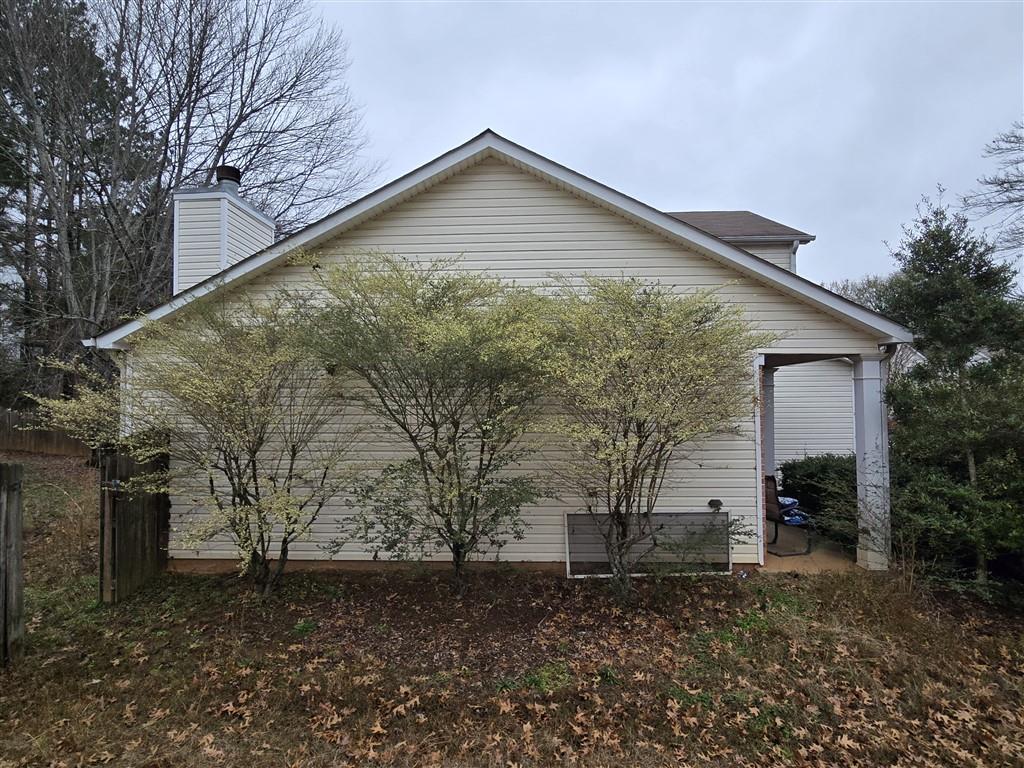 1558 Silver Ridge Drive Southwest Austell, GA 30106 - Photo 3 of 24 a front view of a house with garden