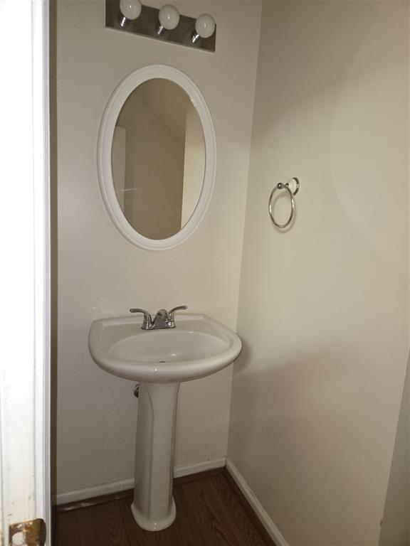 1558 Silver Ridge Drive Southwest Austell, GA 30106 - Photo 10 of 24 a bathroom with a sink and a mirror