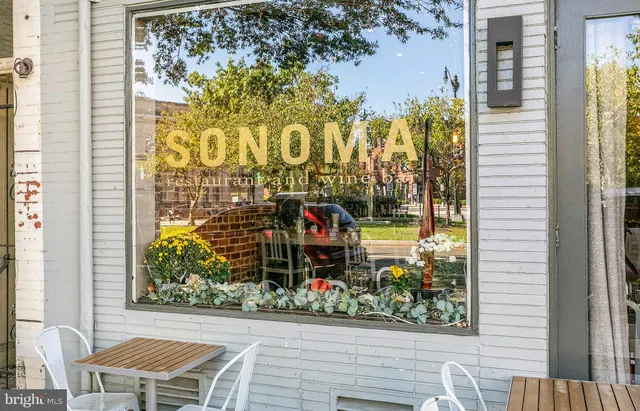 a view of outside area with a sign board